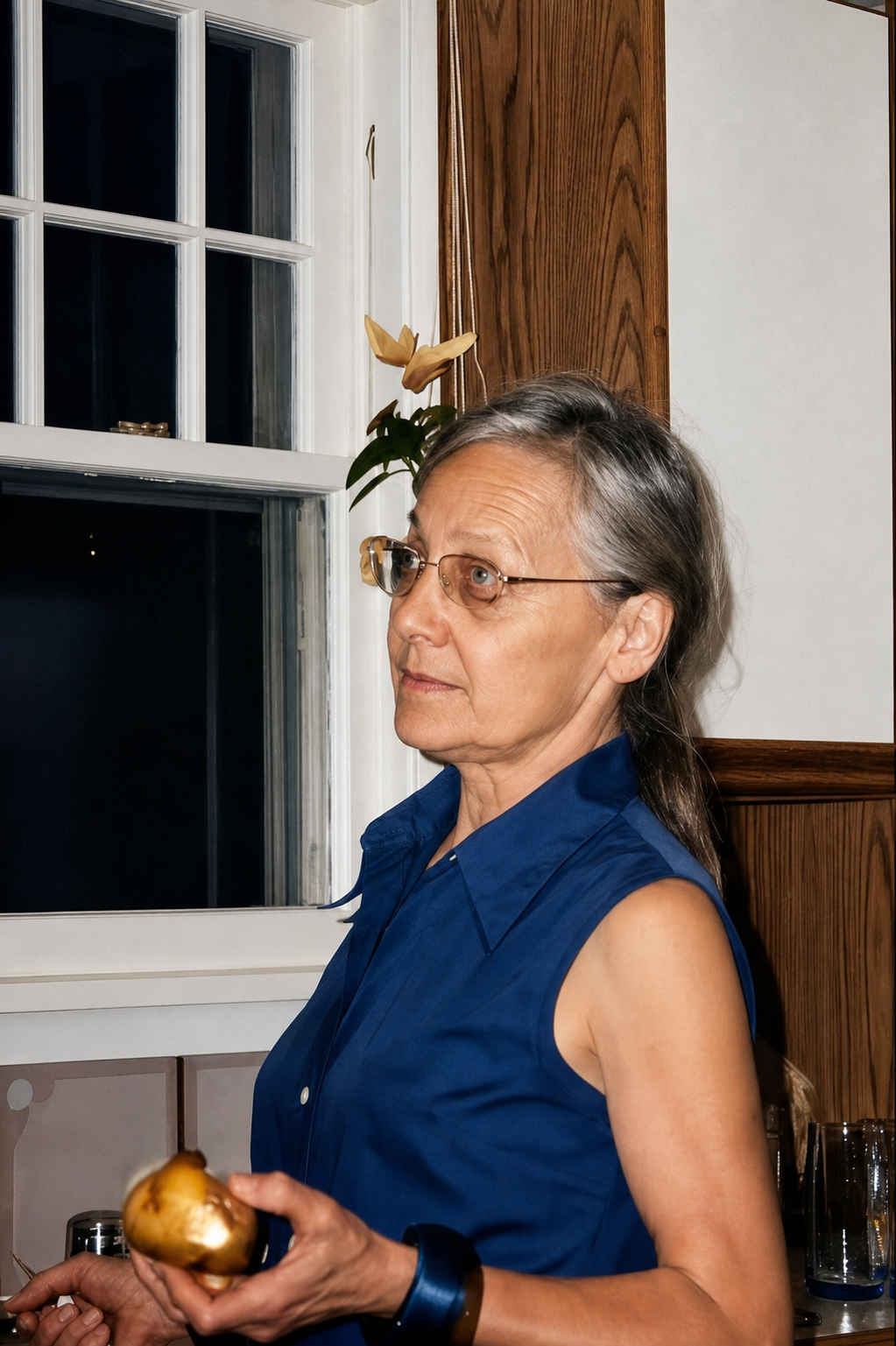 Margaret Peg Gorman standing in her kitchen